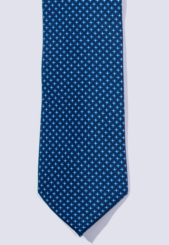 Cravatta uomo blu con micro fantasia geometrica in pura seta