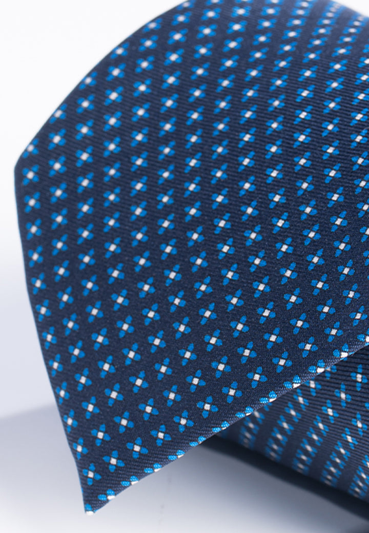 Cravatta uomo blu con micro fantasia geometrica in pura seta