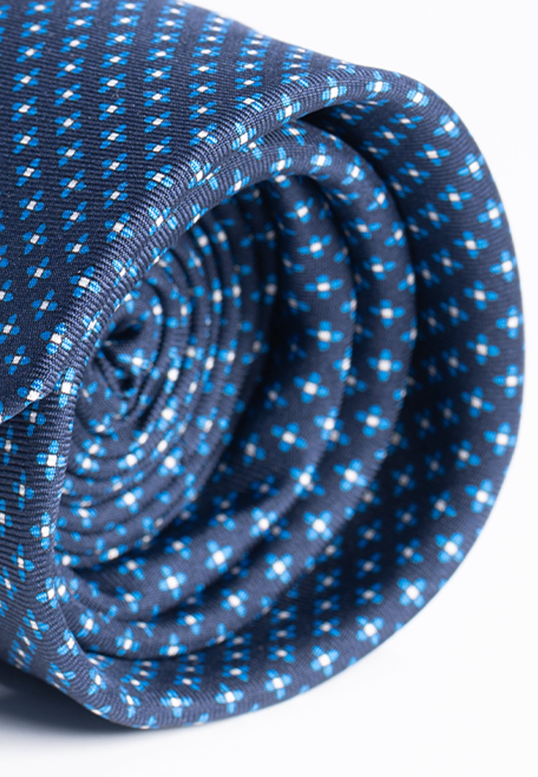 Cravatta uomo blu con micro fantasia geometrica in pura seta
