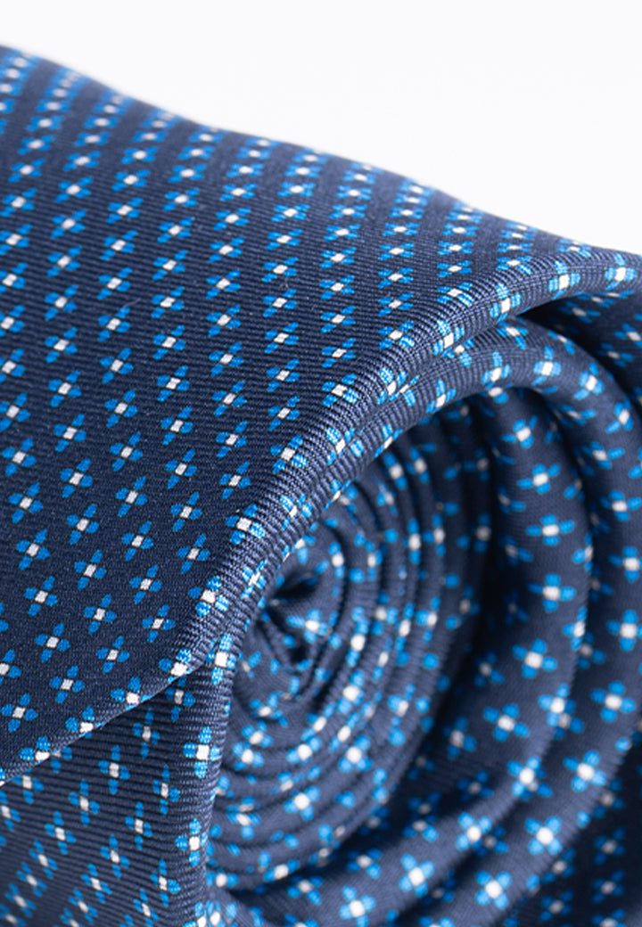 Cravatta uomo blu con micro fantasia geometrica in pura seta