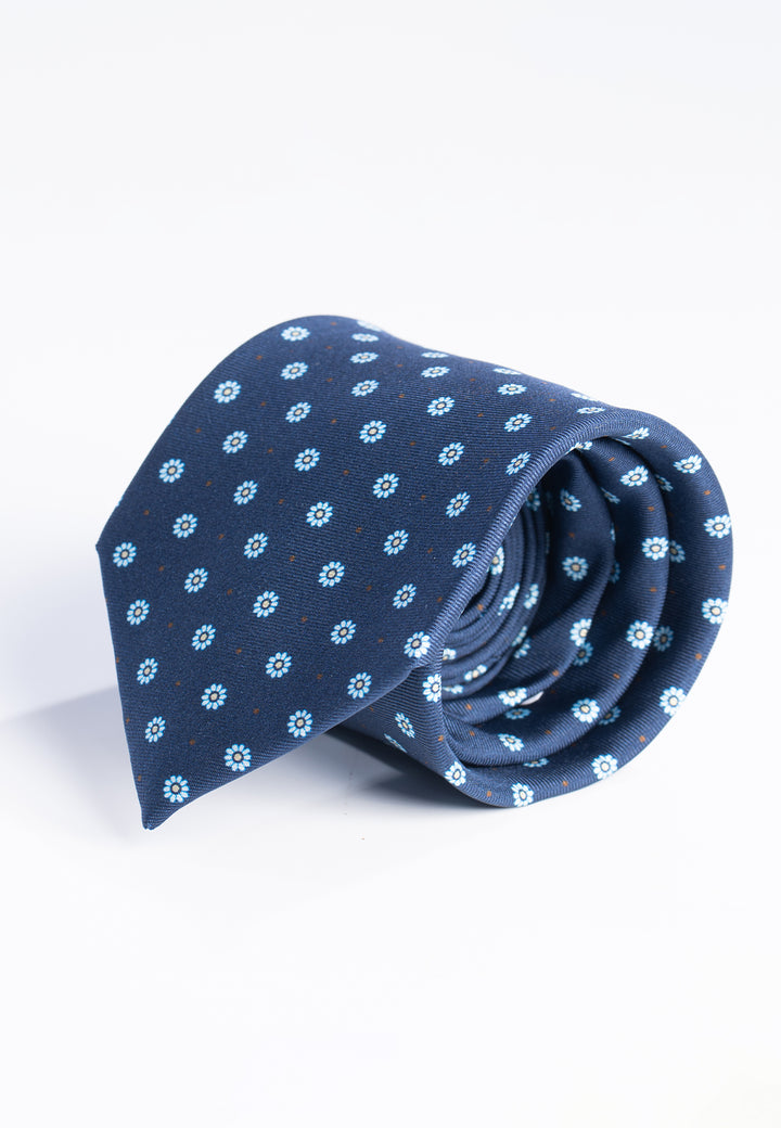 Cravatta uomo blu con fantasia a margherite in pura seta