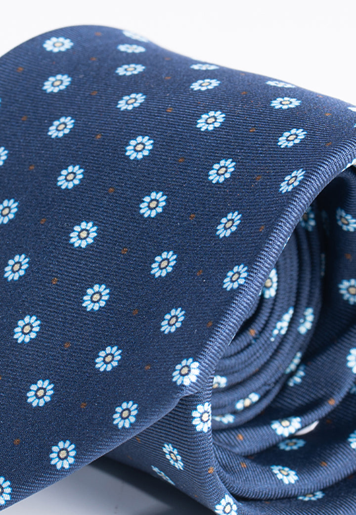 Cravatta uomo blu con fantasia a margherite in pura seta