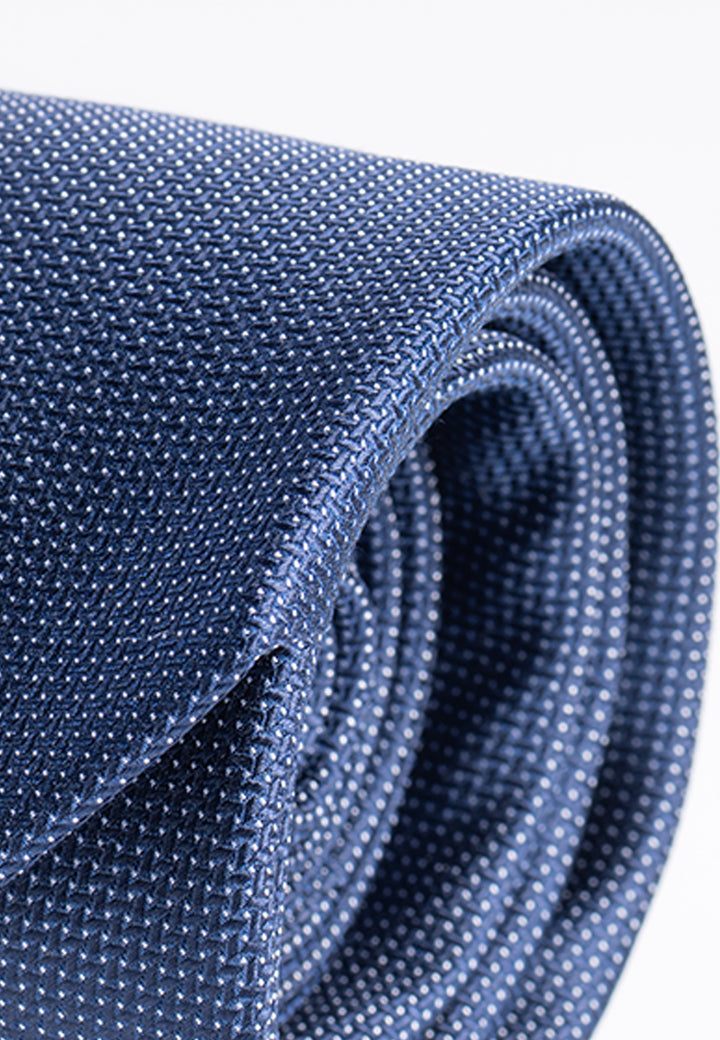 Cravatta uomo blu con micro puntini bianchi in pura seta