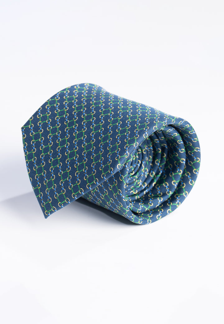 Cravatta uomo blu con fantasia geometrica verde in pura seta