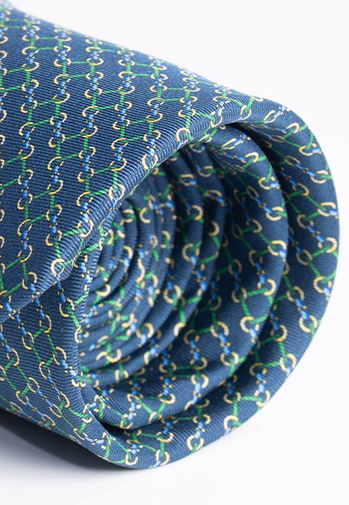 Cravatta uomo blu con fantasia geometrica verde in pura seta