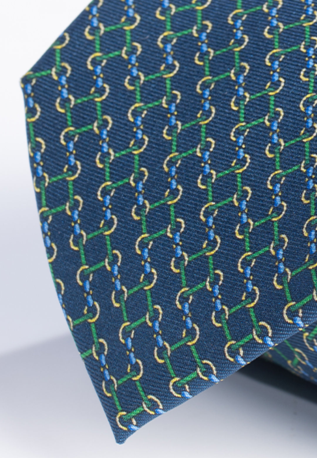 Cravatta uomo blu con fantasia geometrica verde in pura seta