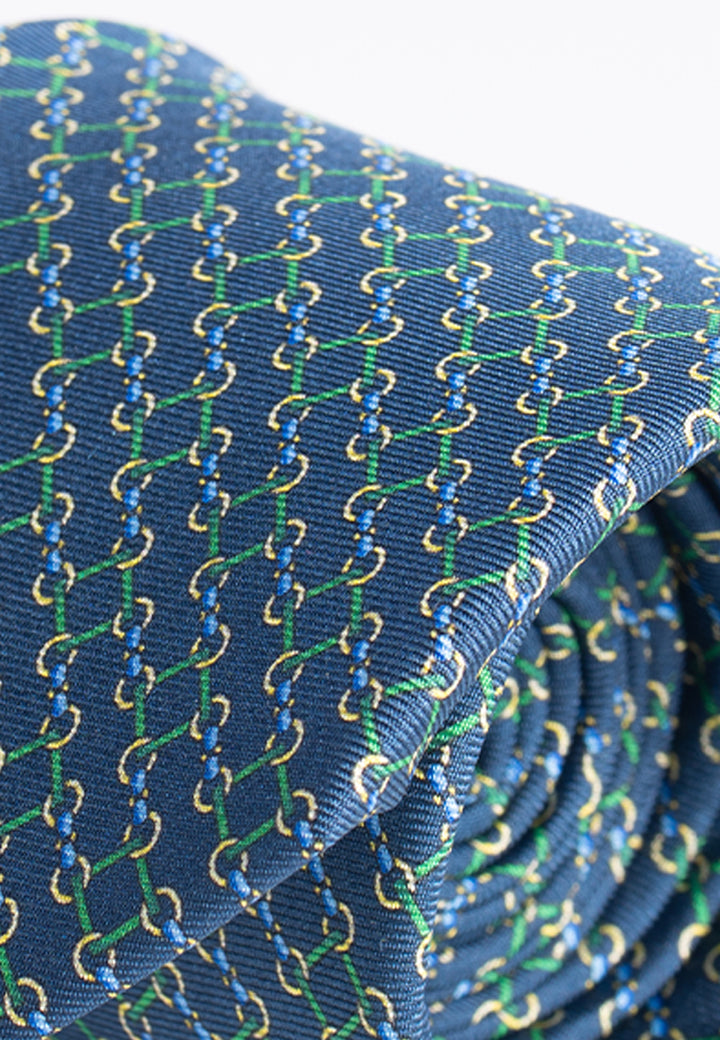 Cravatta uomo blu con fantasia geometrica verde in pura seta