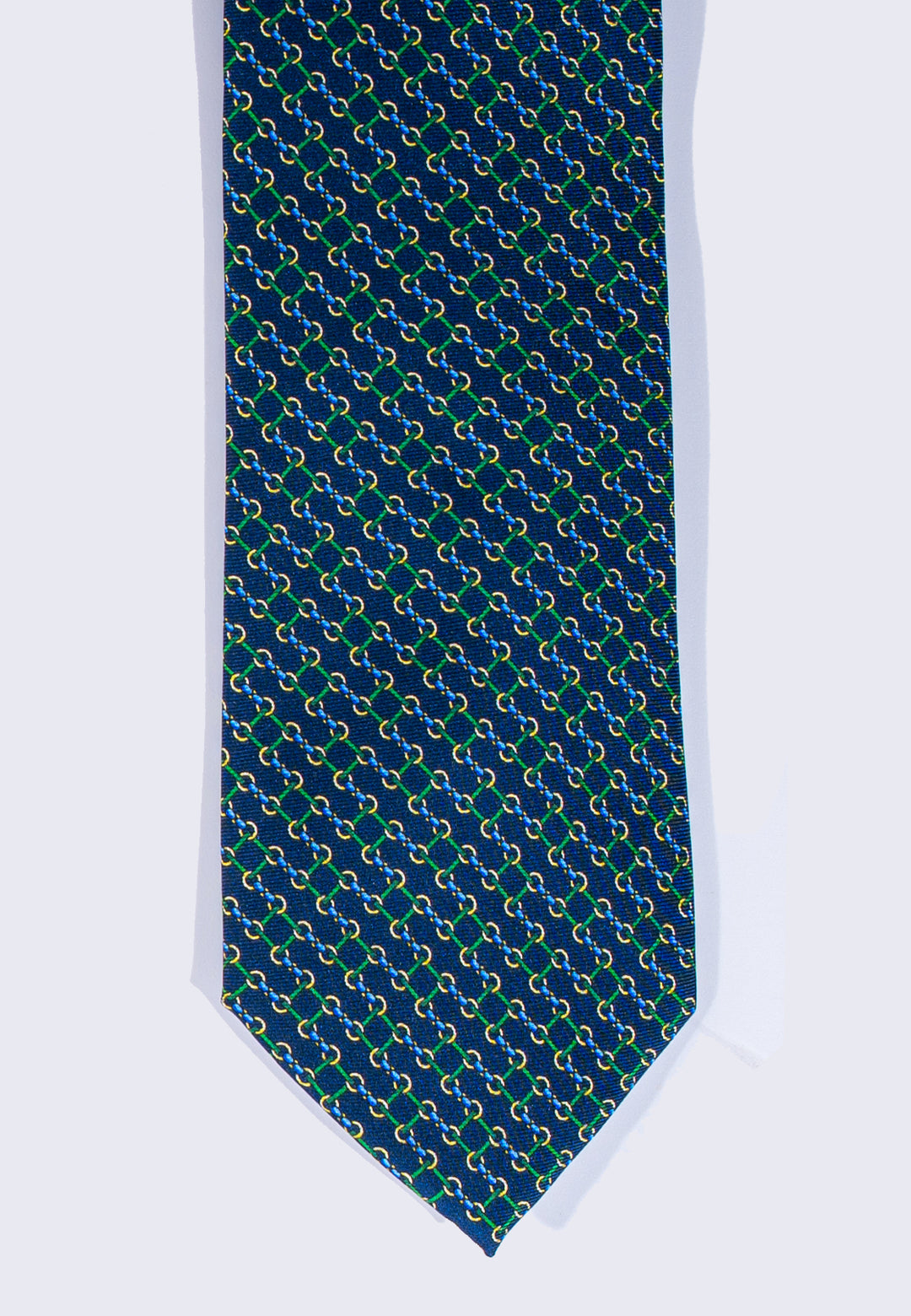 Cravatta uomo blu con fantasia geometrica verde in pura seta