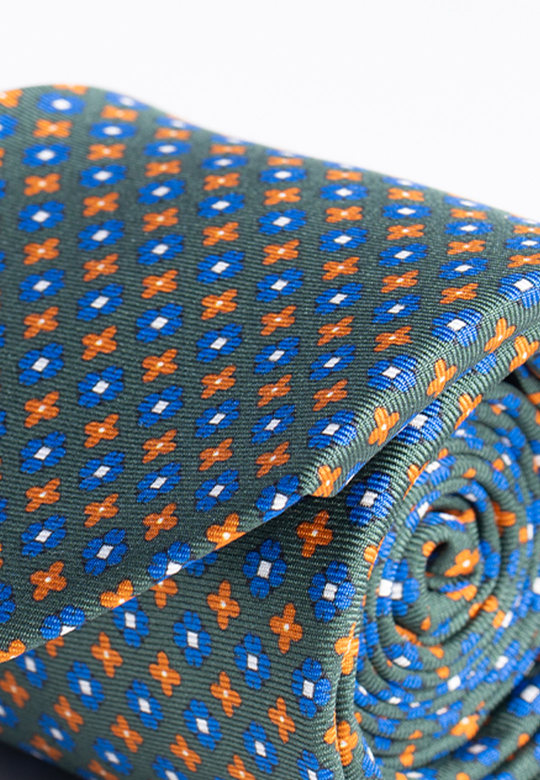 Cravatta uomo verde con microfantasia blu e arancio in pura seta