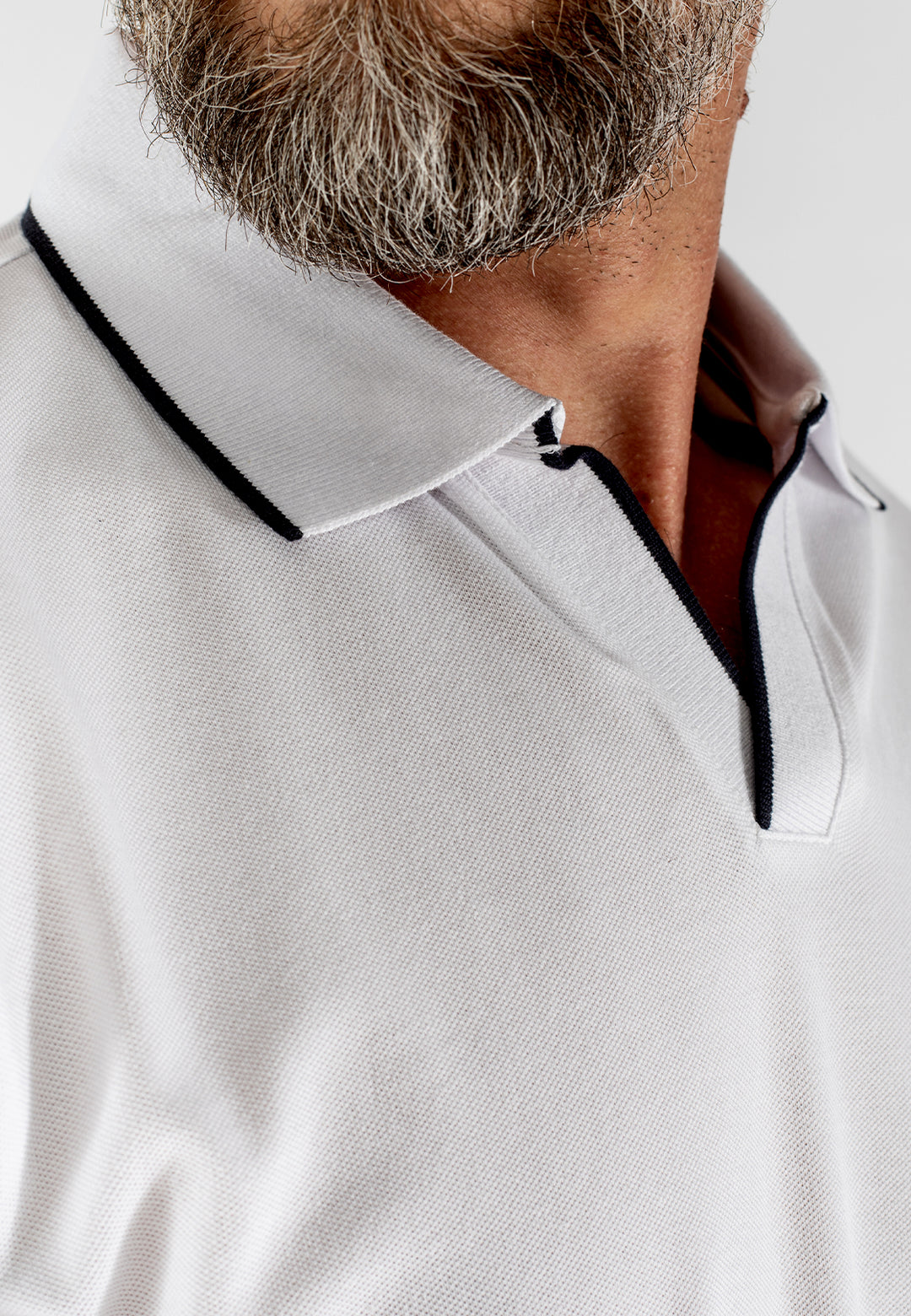 Polo uomo slim fit in cotone elasticizzato con profili colorati