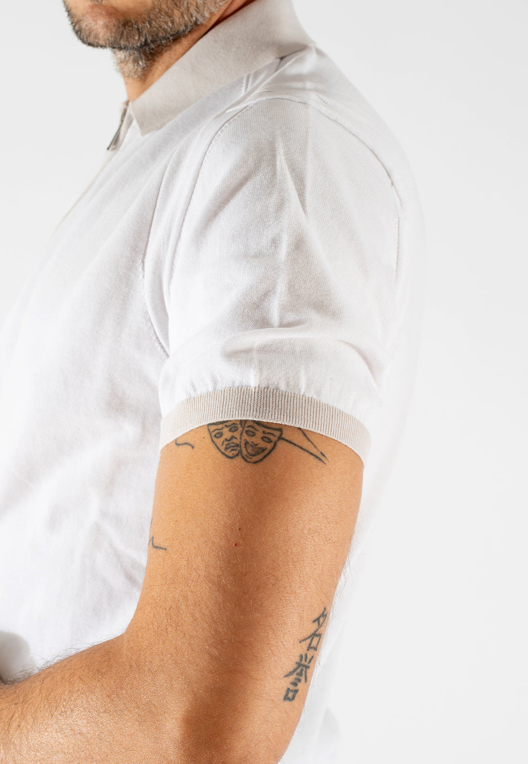 Polo uomo con zip e collo a contrasto